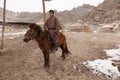 Mongolian horseman and ger camp Royalty Free Stock Photo