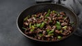 Mongolian meat - beef in dark spicy sauce in asian style Royalty Free Stock Photo