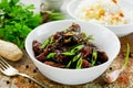 Mongolian meat - beef in dark spicy sauce in asian style Royalty Free Stock Photo