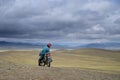 Mongolian on a motorcycle