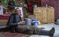 Mongolian nomad man drinking tea