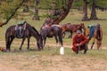 Mongolian shepherds with horses