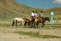 Mongols on horses Royalty Free Stock Photo