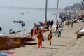 Mongs are walking  in bank of  Holy River the Ganges in  Varanasi, Uttar Prodesh, India. Royalty Free Stock Photo