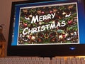Monitor - light game - Merry Christmas Royalty Free Stock Photo