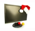 Monitor and Santa Claus hat Royalty Free Stock Photo