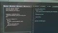 Monitor of software developer typing programming language and html script Royalty Free Stock Photo