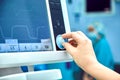 Monitoring patient`s vital sign in operating room. doctor cheking at patient`s vital signs. Cardiogram monitor during Royalty Free Stock Photo