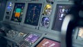 Monitors on a plane`s dashboard, close up.