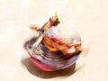 Monk in a bull deity mask performs a sacred dance of Tantric Tibetan Buddhism in Lamayuru monastery. Blurred motion technique Royalty Free Stock Photo