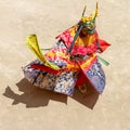 Monk in a bull deity mask with ritual dagger phurpa performs a religious masked and costumed Cham dance of Tibetan Buddhism Royalty Free Stock Photo