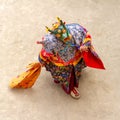 Monk in a bull deity mask with ritual dagger phurpa performs a religious masked and costumed Cham dance of Tibetan Buddhism