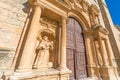 Monk with child statue in Penaranda de Duero