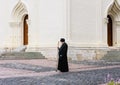 Monk and the Church of the Descent of the Holy Spirit. Holy Trinity St. Sergius Lavra. Sergiev Posad Royalty Free Stock Photo