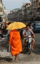 Monk collecting alms