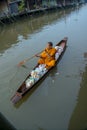 Monk Collecting Alms at Amphawa River