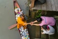 Monk Collecting Alms at Amphawa River