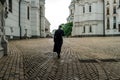 Monk crossing himself in the yard of Kyiv Pechersk Lavra