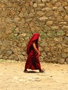 Monk dressed in red at Samye monastery, Tibet, China Royalty Free Stock Photo