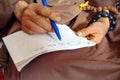 Monk Hands Writing