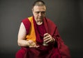 Monk holding ritual bell and vajra Royalty Free Stock Photo