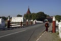 Monk and King Palace in Mandalay, Myanmar (Burma) Royalty Free Stock Photo