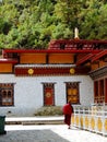 Monk at Lhakhang Karpo White temple in Haa valley located in Paro, Bhutan Royalty Free Stock Photo