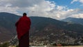 A Monk in the mountain around Thimphu near the Buddha Dordenma statue, during a prayer ceremony.