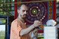 Monk performing ritual in a Krishna temple. Festival Vedalife. Kyiv, Ukraine Royalty Free Stock Photo