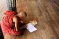 Monk Play With Cat In Shwe Yan Pyay Monastery, Nyaungshwe, Myanmar