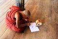 Monk Play With Cat In Shwe Yan Pyay Monastery, Nyaungshwe, Myanmar Royalty Free Stock Photo