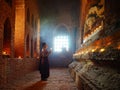 Monk pray with candle in Bagan, Myanmar Royalty Free Stock Photo