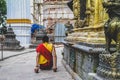 Monk prays in Kathmandu, Nepal.