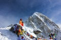 Monk prays in the snowy mountains of Nepal