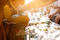 Monk receiving food and items offering