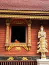 Monk Sat Back in The Window in The Wooden Church