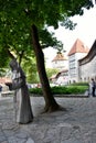 Monk statue in old town of Tallinn, Estonia