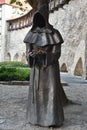 Monk statue in old town of Tallinn, Estonia