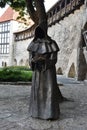 Monk statue in old town of Tallinn, Estonia Royalty Free Stock Photo