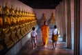 Monk and tow boy student at Golden buddha statue, Makhabucha day