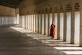 Monk in Tunnel Entrance to Shwezigon Pagoda in Bagan Myanmar, Burma Royalty Free Stock Photo