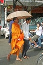 Monk with umbrella Royalty Free Stock Photo