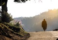 A monk walking in the morning