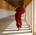 A monk walking at Shwezigon temple in Bagan, Myanmar