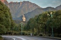 MOUNT JIUHUA, ANHUI PROVINCE, CHINA Ã¢â¬â CIRCA OCTOBER 2017: A monk walks in front of statue of Dizang Pusa