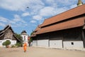 A monk walks at temple Wat Phra That Lampang Luang in Lampang province