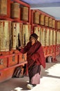 A monk was whirling prayer wheel