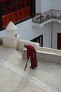 A monk working at Rumtse temple in Ladakh, India Royalty Free Stock Photo