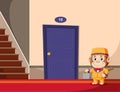 The monkey as the bell boy holding the grey suite case standing in front of the hotel`s door Royalty Free Stock Photo