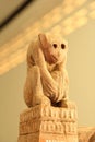 Monkey-carved wooden pillars